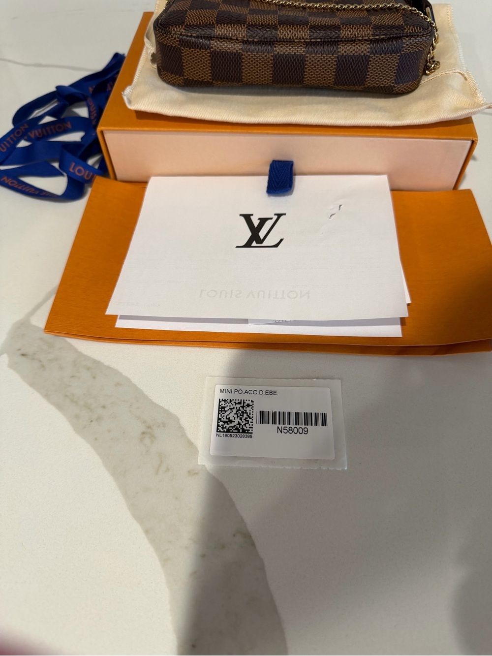 Louis Vuitton Mini Poschette Accessoires in Damier Ebene - Picture 10 of 16